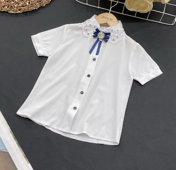 Нарядная белая блузка в школу